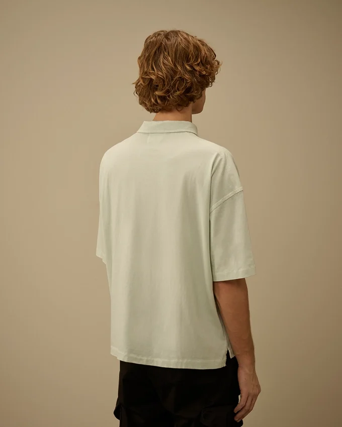 20/1 Jersey Kurzarm-Polo mit kastenförmigem Logo