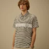 Bedrucktes Jersey-Polohemd mit kurzen Ärmeln und Logo, 20/1