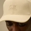 Gabardine-Kappe mit Kontraststreifen