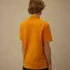 Kurzärmeliges Polohemd mit Brusttasche aus Stretch-Piqué