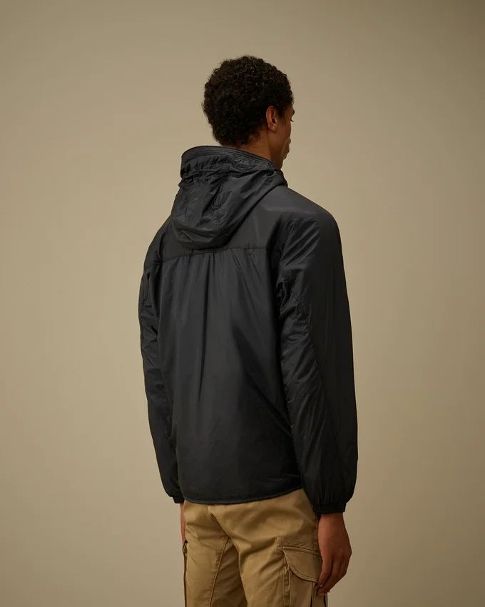 Nada Shield – zusammenpackbare Primaloft® Evolve-Kapuzenjacke mit Linsen-Design