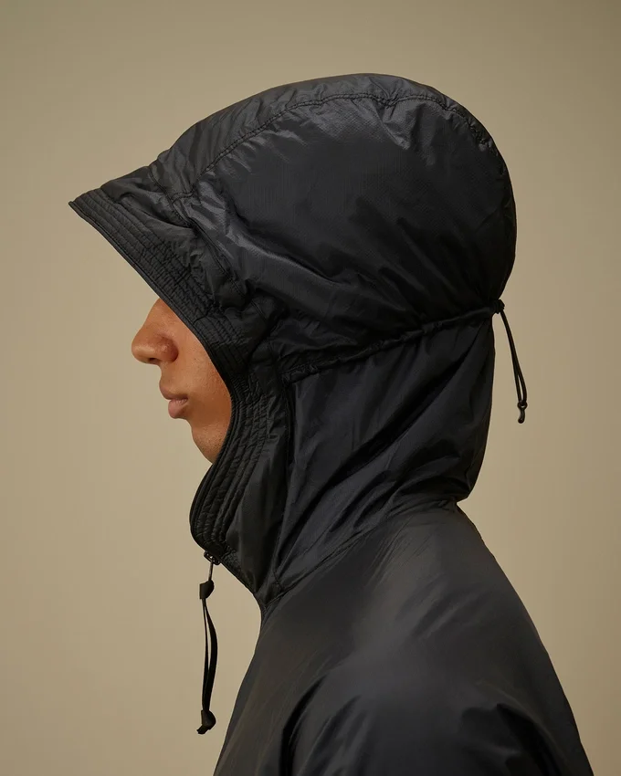 Nada Shield – zusammenpackbare Primaloft® Evolve-Kapuzenjacke mit Linsen-Design