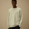 Sweatshirt aus diagonal gewebtem Baumwollfleece mit Resist-Färbung und Rundhalsausschnitt sowie Logo
