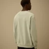 Sweatshirt aus diagonal gewebtem Baumwollfleece mit Resist-Färbung und Rundhalsausschnitt sowie Logo