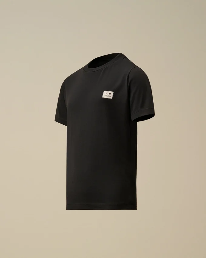 U16 Baumwoll-Jersey 30/1 Kurzarm-Hemd mit Logo-Aufnäher